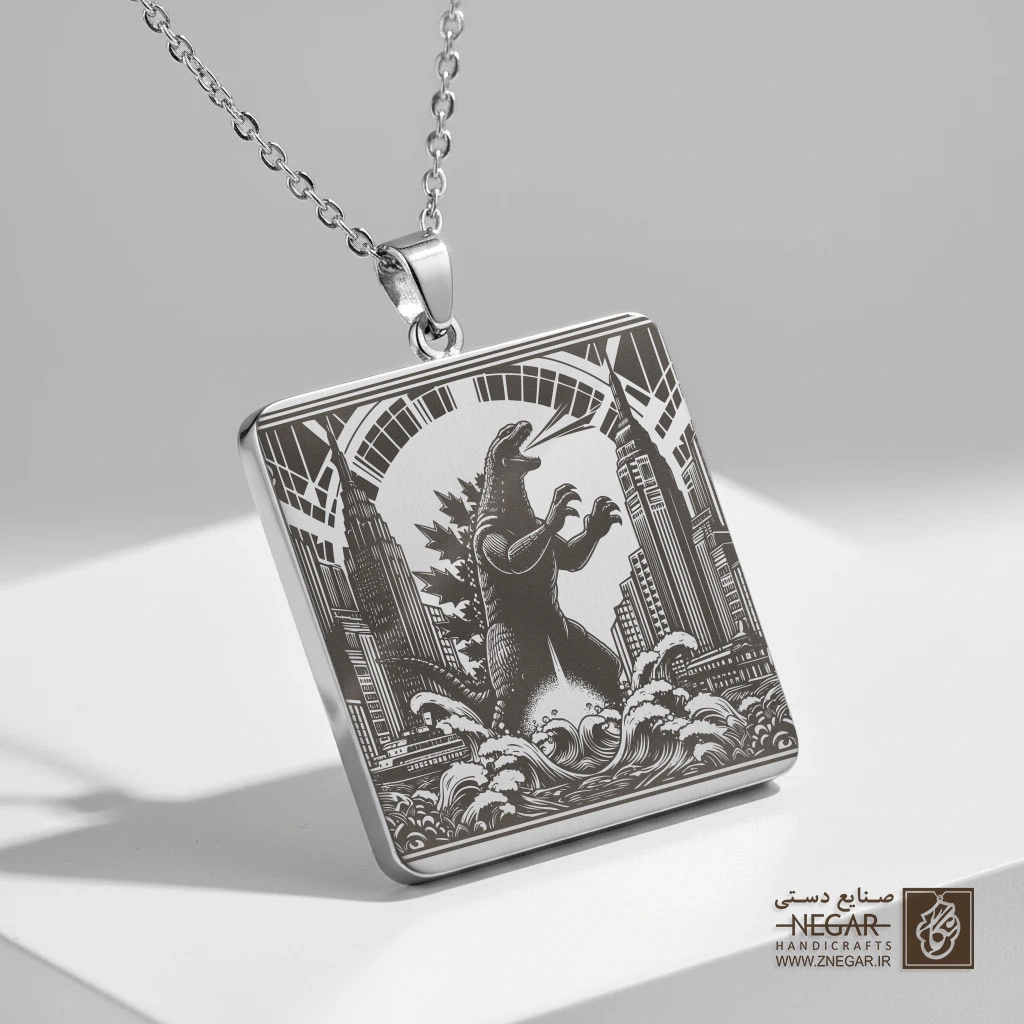 گردنبند طرح گودزیلا میان آسمان‌خراش‌ها (حکاکی لیزری فایبر، مدل قاب مربع) کد 501484